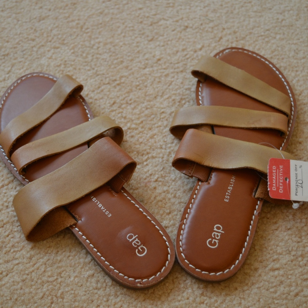 Sun-bleached tan leather slides